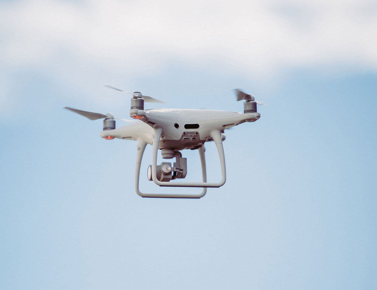 Proin pretium eros diam id feugiat mauris 1 White drone in mid air